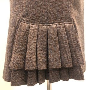 Wool, pencil skirt with fish tail pleats in back. Brown, tweed and CHIC!